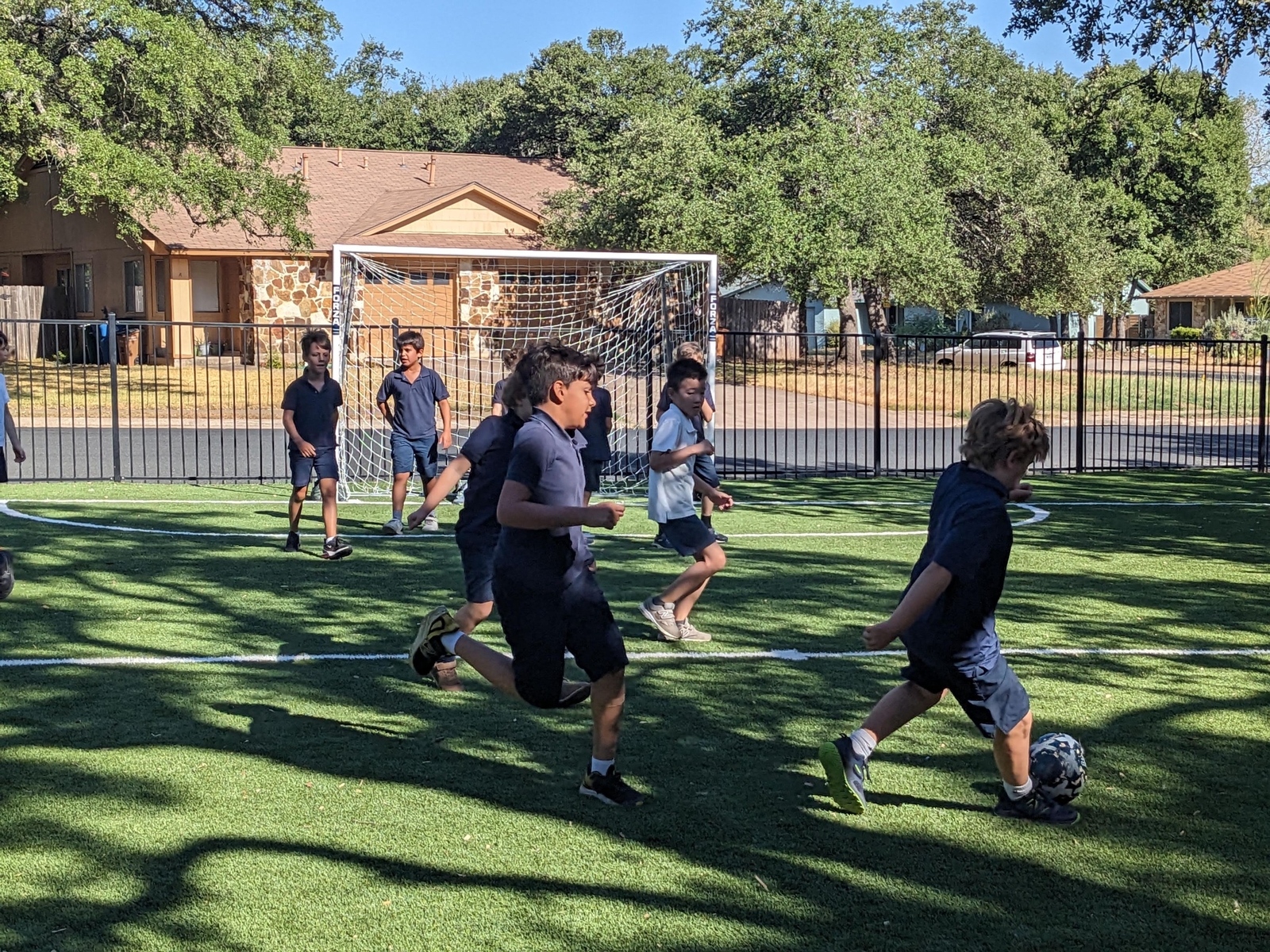 Austin International School students engaging in sport activity, such as soccer.